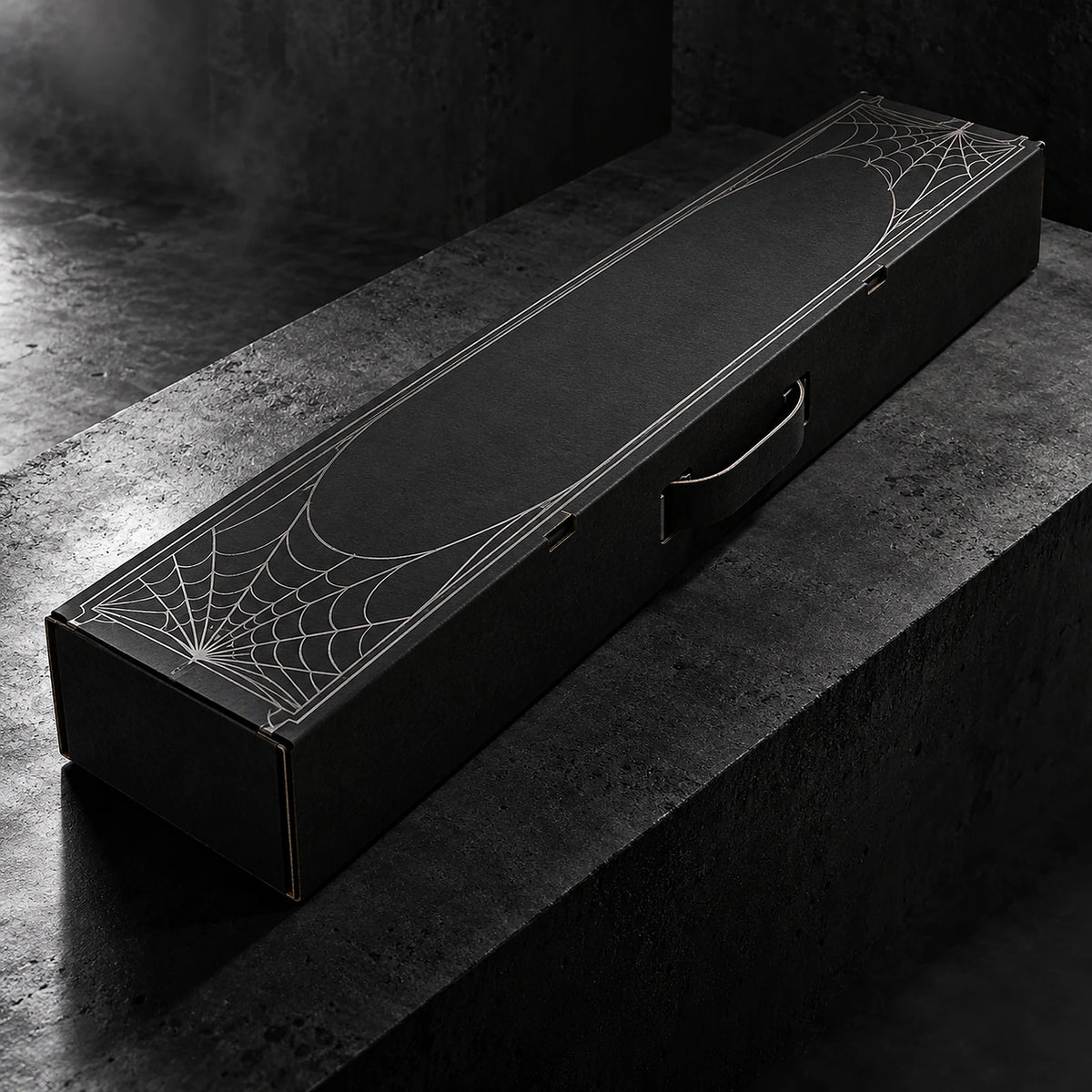 Conceptual ARACHNEX Architect Fit elongated black cardboard packaging with silver web print.