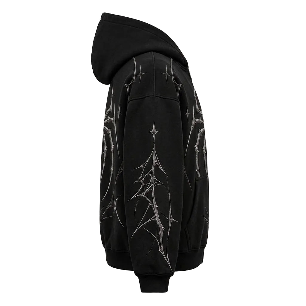 A black pullover hoodie shown from the side, featuring a white thorny branch graphic pattern printed across the body and sleeves, set against a textured gray background.