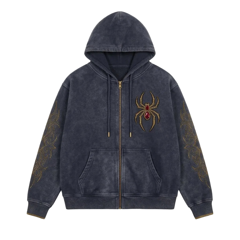 A dark gray zip-up hoodie with a washed texture, featuring a gold spider graphic with a red jewel on the chest and gold sleeve patterns, displayed against a neutral gray background.